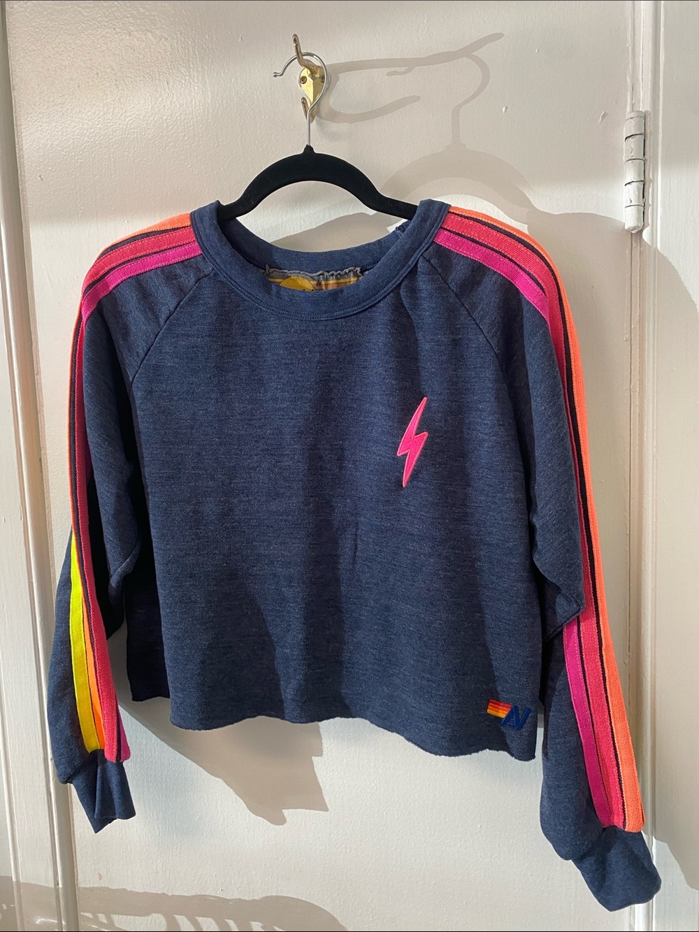 Womens cropped Navy Sweatshirt with Pink Lightning Bolt and Rainbow Stripes